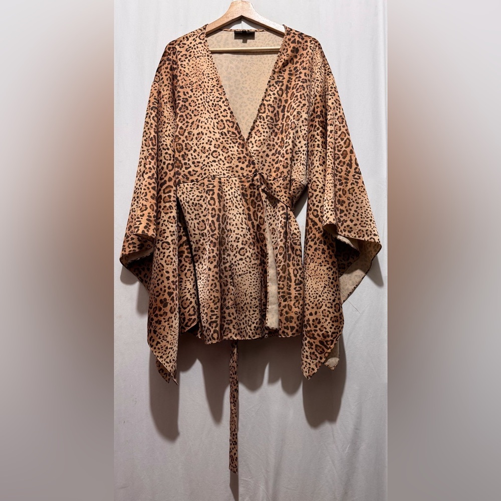 Michael Costello x Revolve wrap top in a leopard print